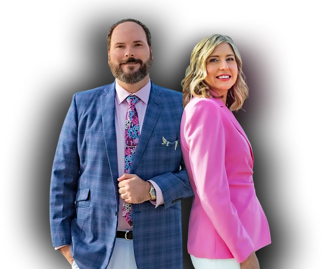 Attorneys Keith and Callie Petrochko stand next to each other in suit jackets